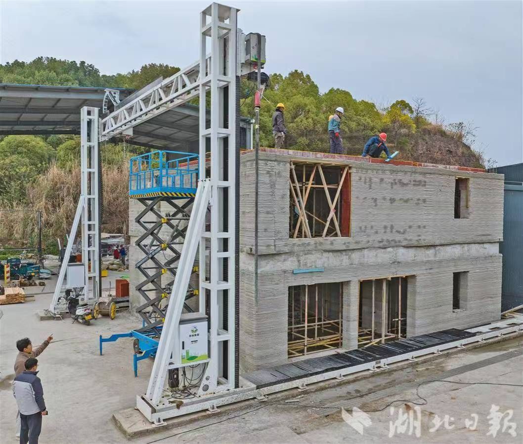 【湖北日报】KY开元集团官网“打印”出双层小楼-1027-媒体关注